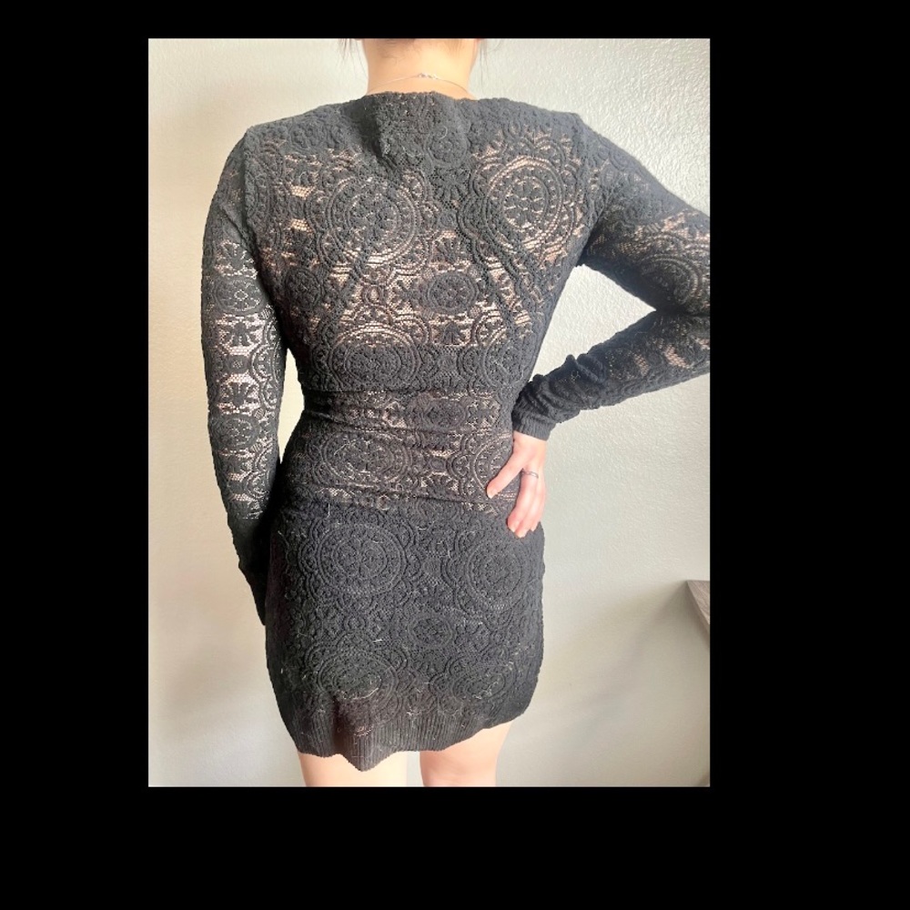 Black lace bathing suit cover up. Can be styled in a different way as well.